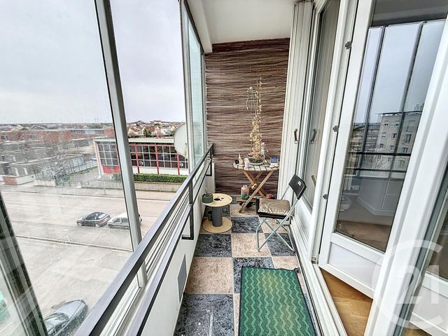 Afficher la photo en grand Appartement F4 à vendre - 4 pièces - 77.36 m2 - CHENOVE - 21 - BOURGOGNE - Century 21 Martinot Immobilier